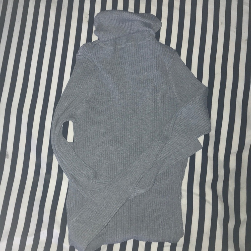 A gray turtle neck